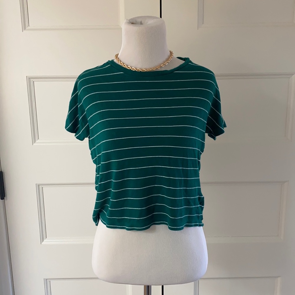 BP green top with horizontal white stripes